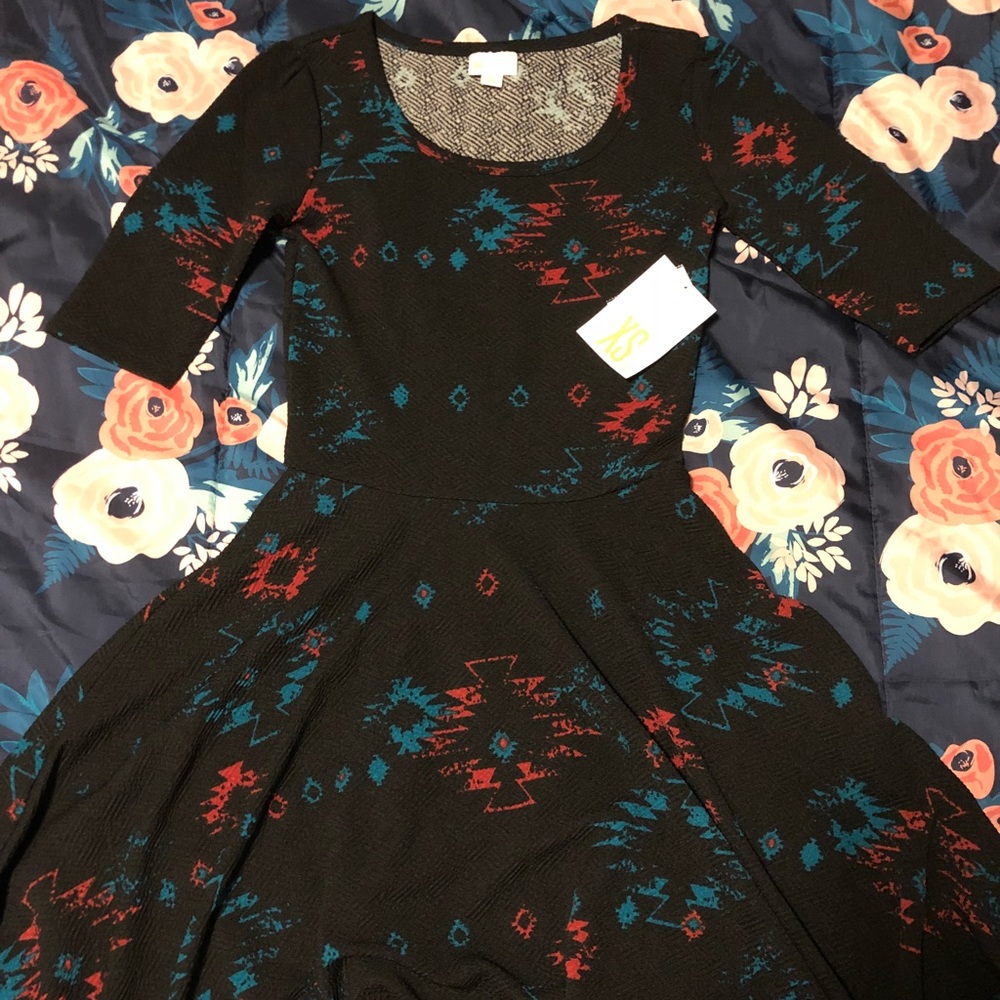 XS Lularoe Nicole dress Aztec print. NWT